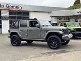 Jeep Wrangler Unlimited Sahara 4xe + elektr. Softtop - Jeep Wrangler X mit Hybrid-Antrieb (Benzin/Elektro)
