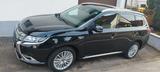 Mitsubishi Outlander 2.4 Plug-in Hybrid 4WD /Top/Garantie - Mitsubishi Outlander Top mit Hybrid-Antrieb (Benzin/Elektro)