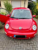 Volkswagen Roter Beetle im gepflegten Zustand - gebrauchte VW Beetle aus dem Jahr 2005