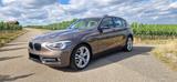 BMW 118d Sport Line  - BMW 1 Series: Braun
