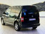 Volkswagen Caddy-Behindertengerecht-elk.Schwenksitz+Kran - Volkswagen Caddy mit Benzin-Antrieb: mit Klimaanlage