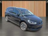 Volkswagen Touran 1.5 TSI DSG Comfortline*7 Sitze*Navi* - Volkswagen Touran mit Benzin-Antrieb: Kleinbus