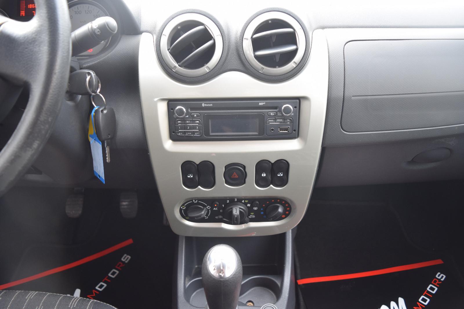 Dacia Logan 2013 — photo 11