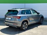 Skoda 150PS DSG Sportline NAVI ACC KAMERA eHK LM19"AHK - graue Skoda Karoq