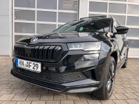 SKODA Karoq 2.0 TSI DSG 4x4 Sportline PANO AHK 5J GAR bei Autohaus Landmann & Maier OHG