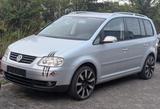 Volkswagen Touran 1.6 FSI Basis Basis - Volkswagen Touran Basis mit Benzin-Antrieb