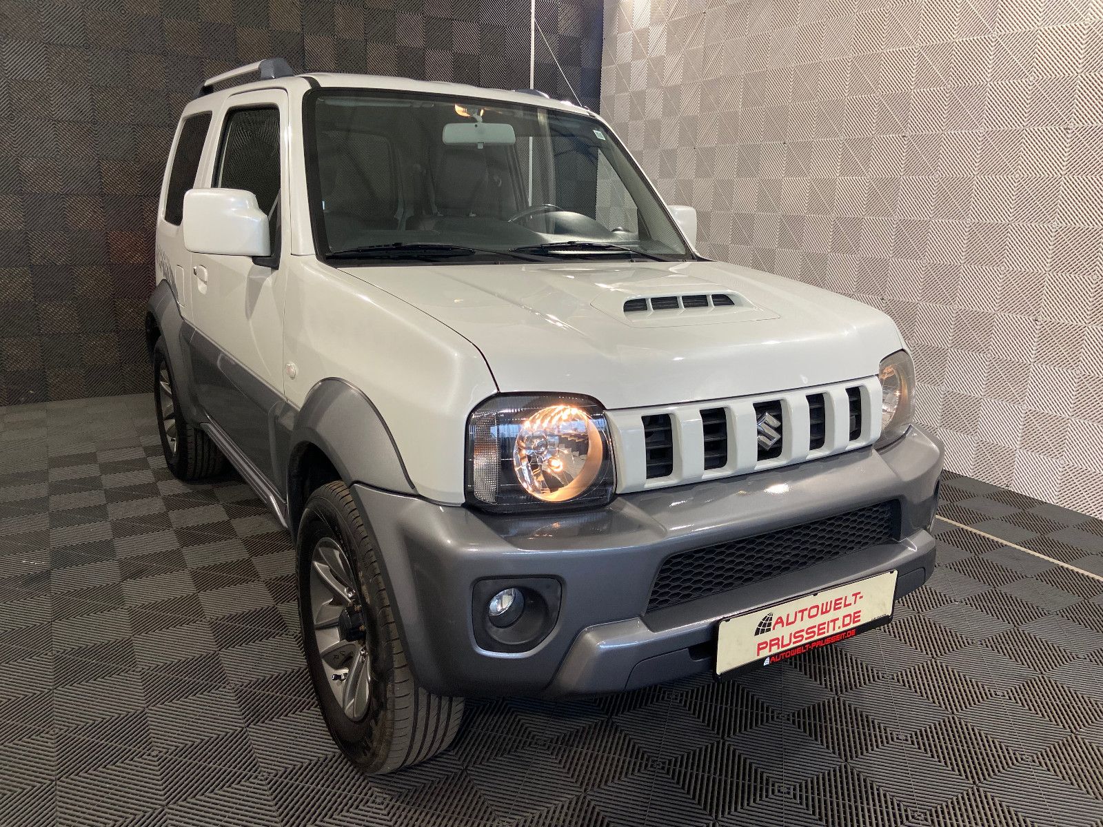 Gebrauchtwagen Suzuki Jimny Jimny Ranger 4×4*Comfort*SHZ-KLIMA-AHK-METALLIC in Künzell