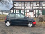 Volkswagen VW Lupo schwarz/rot 2001-wenig Kilometer -... - gebrauchte VW Lupo aus dem Jahr 2001