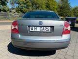 Volkswagen Passat 2.0 KLIMAAUTO TLEDER TÜV SHZ - gebrauchte VW Passat aus dem Jahr 2003
