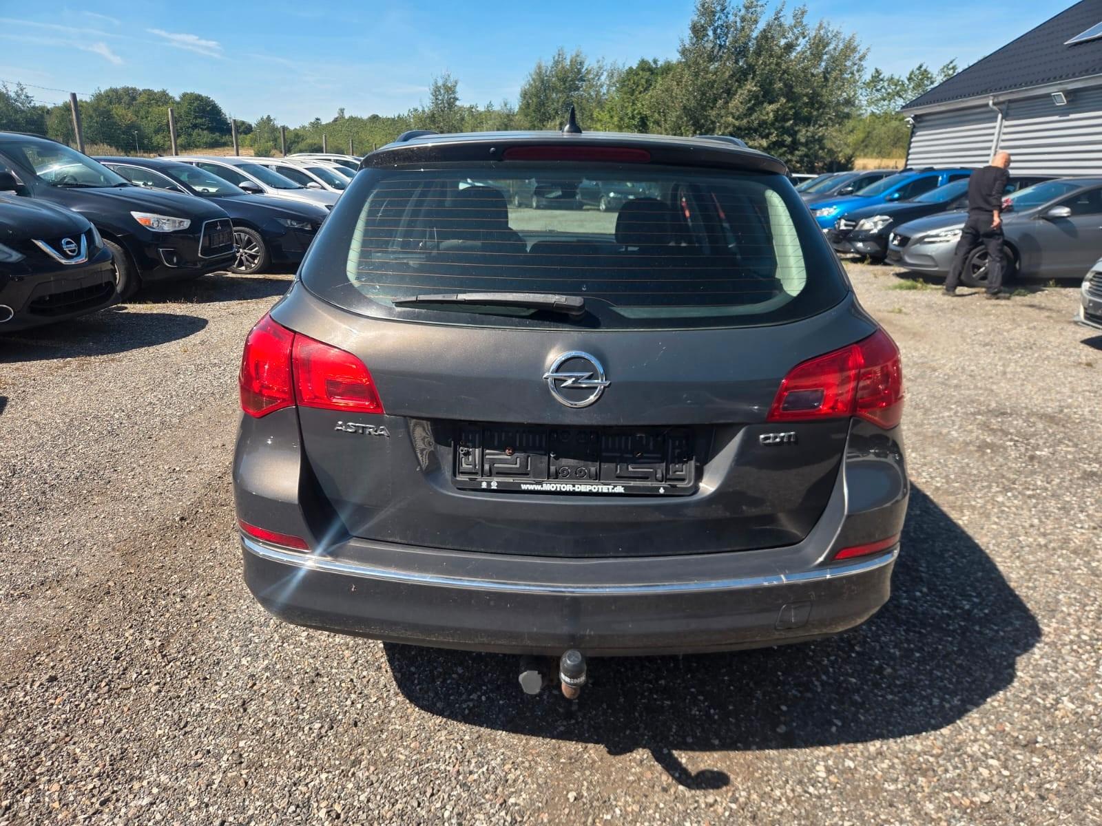 Opel Astra 2015 — engine 1.598 cm³, 110 HP (81kW)