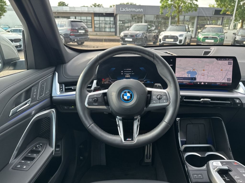 BMW X1 xDrive 30e M Sportpaket AHK Pano ACC HUD Harm foto 8