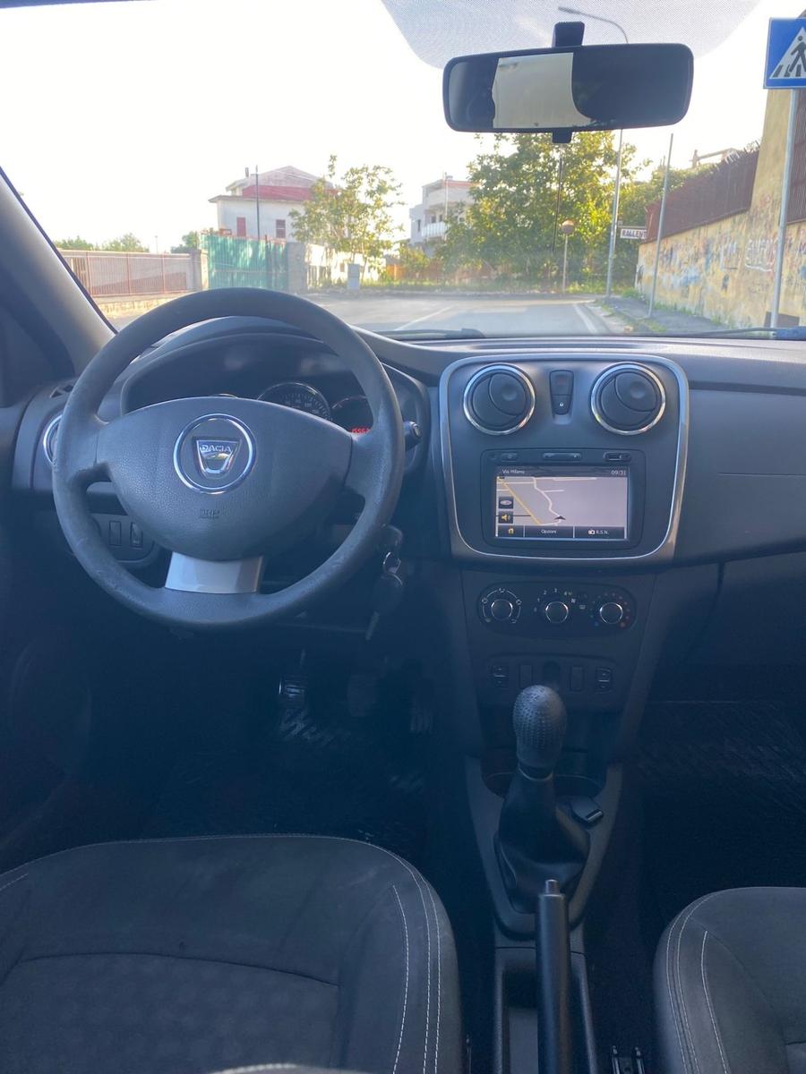 Dacia Logan 2014 — photo 11