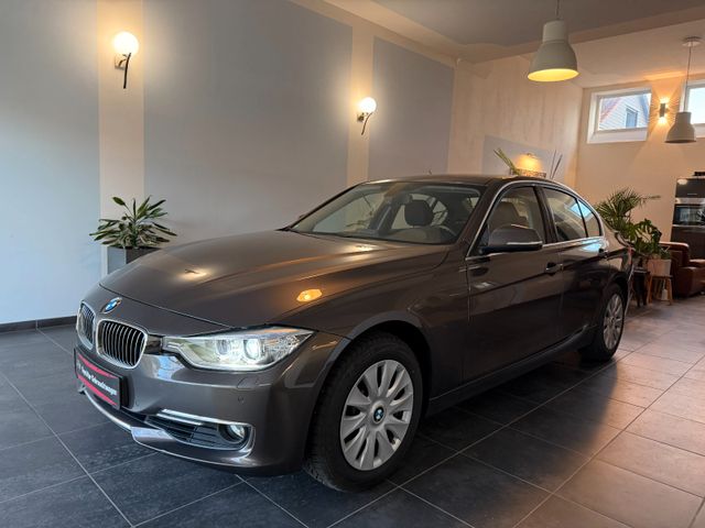 BMW 320i Lim. Luxury*Xenon*Navi*SHz*Tel.*PDC*