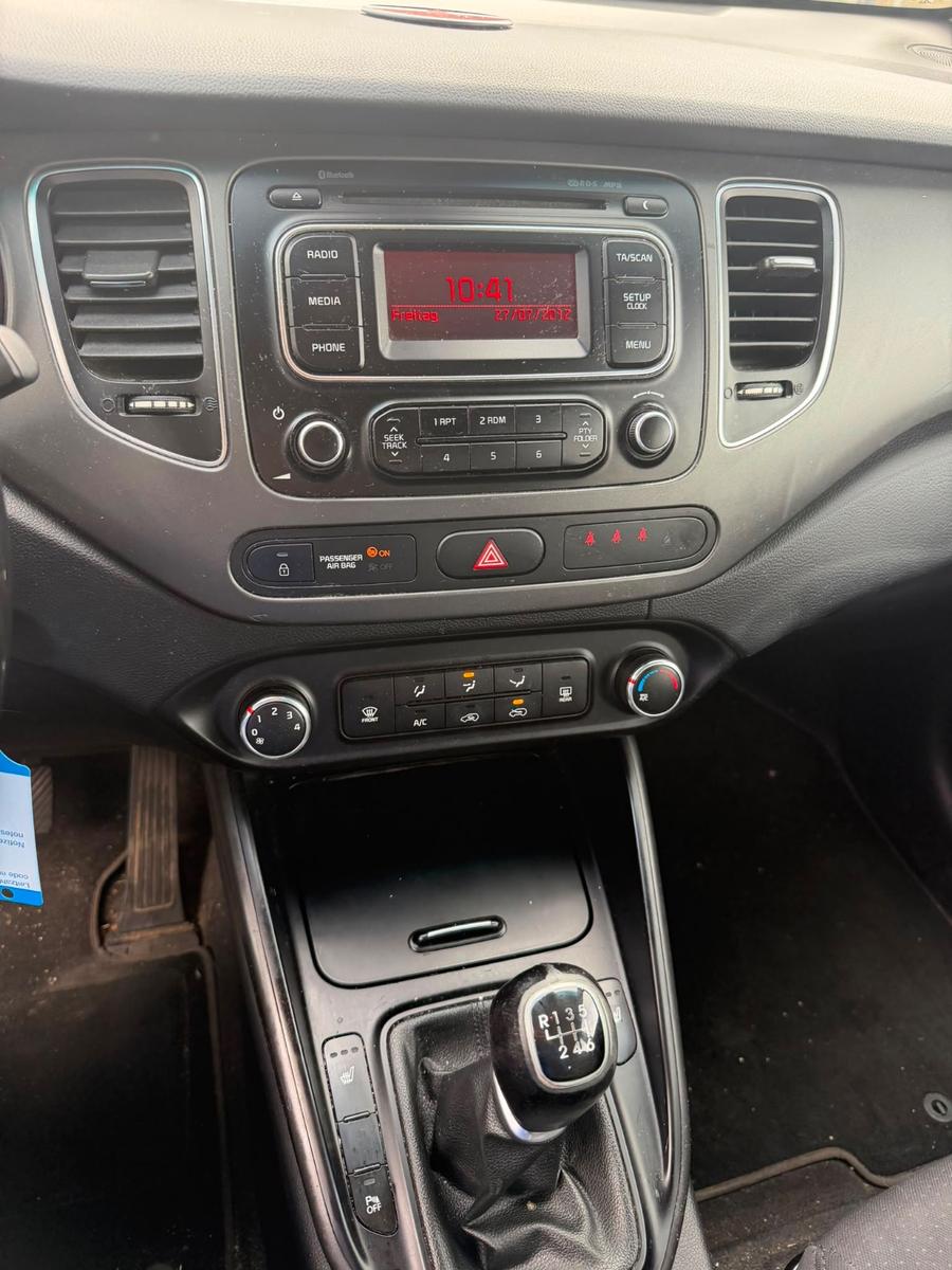Kia Carens 2014 — photo 16