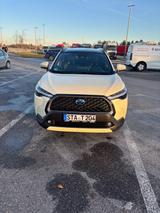 Toyota Corolla Cross 1.8-l-VVT-i Hybrid Team Deutsc... - weiße Toyota Corolla Cross