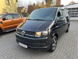 Volkswagen T6 Bulli lang*NAVI*PDC*AHK*9SITZER*TEMPOMAT - Volkswagen T6 Transporter in Bonn