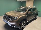 Dacia Duster II Prestige/Kamera/AHK/99€ mtl. - Dacia Duster mit Benzin-Antrieb: Braun