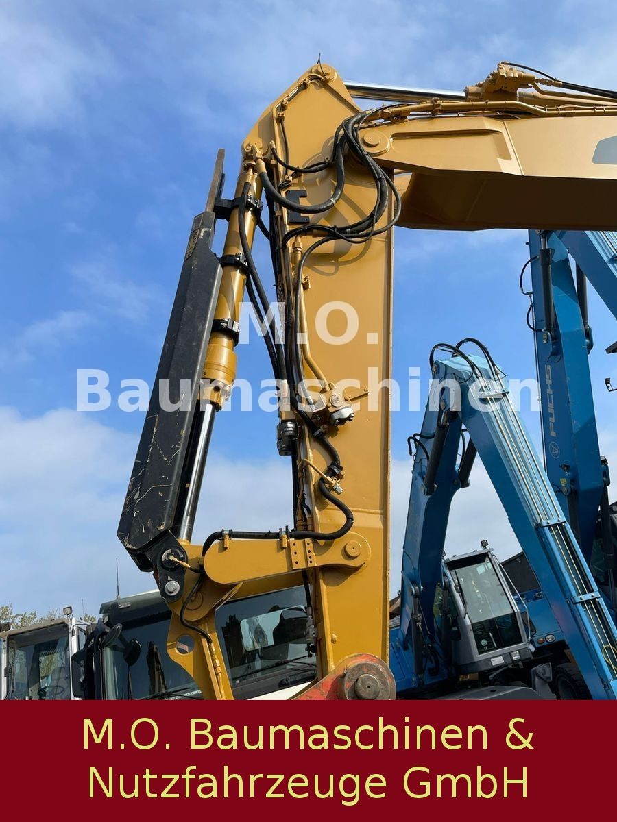 Fahrzeugabbildung CAT M 318 D  / SW /Hammerline + Hammer/ VSA / AC /
