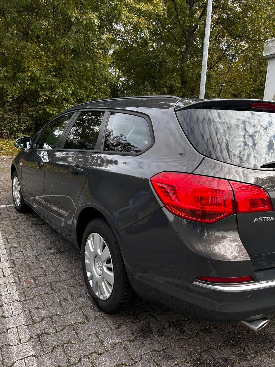 Opel Astra 2014 — фото 7