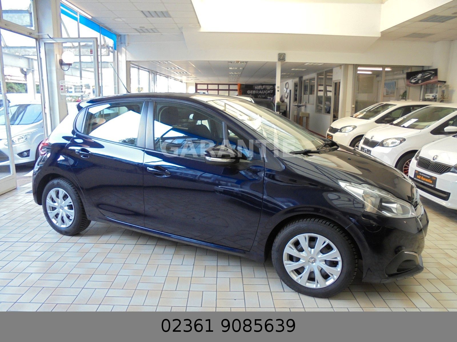 Fahrzeugabbildung Peugeot 208 Active Klima/Sitzheizung/Parktronik/33 Tkm/