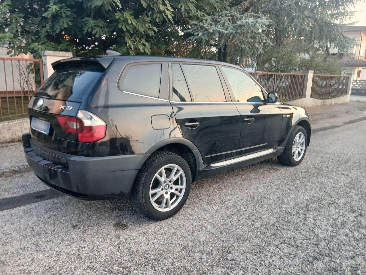 BMW X3 2006 — interior