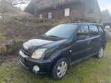 Subaru Justy 1.5 - - schwarze Subaru Justy