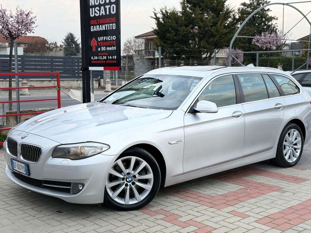 BMW 520 2011 — rear view