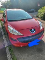 Peugeot Sparsamer roter Peugeot zu Verkaufen! - mit Diesel-Antrieb: Sparsame