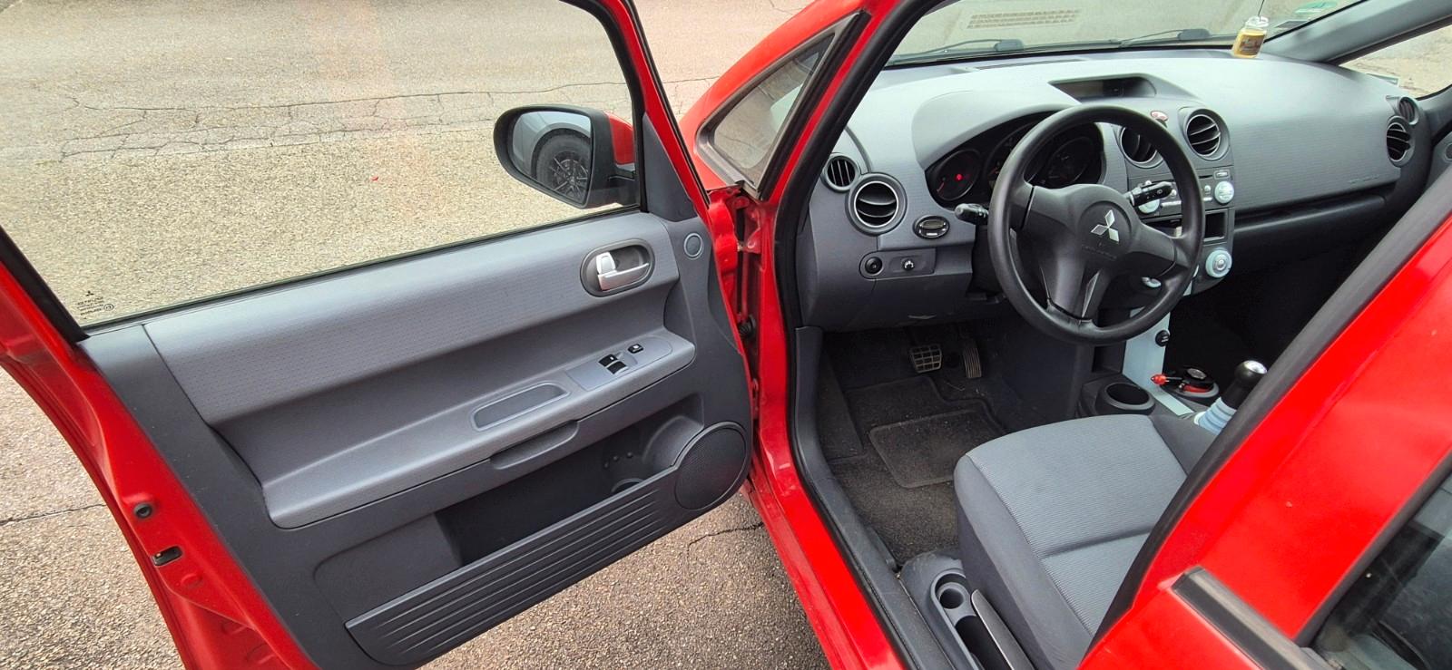 Mitsubishi Colt 2006 — photo 9