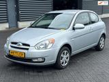 Hyundai Accent 1.4i Dynamic Joy , Airco / motorschade - Hyundai Accent: 1.4
