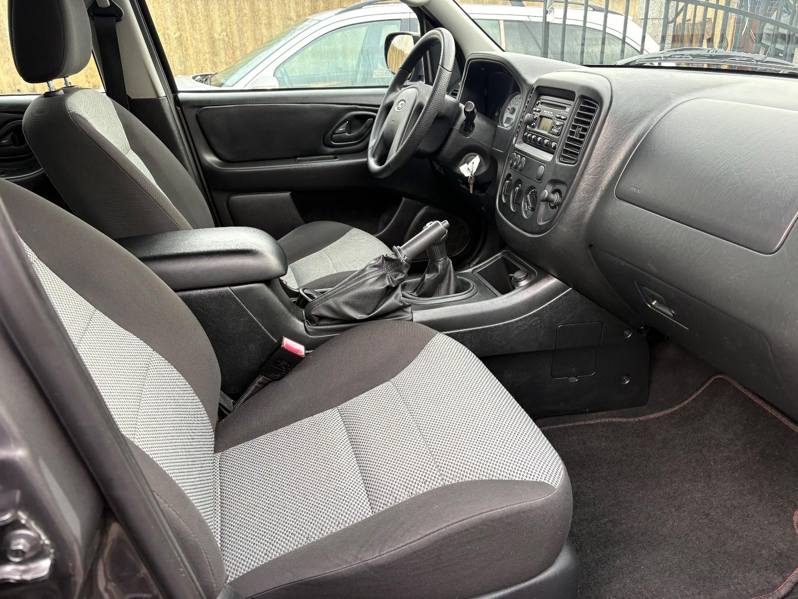 Ford Maverick 2004 — photo 6