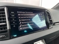 Skoda Karoq 1.5 TSI DSG Sportline PANO KAM AHK 4JGAR bei Autohaus Landmann & Maier OHG