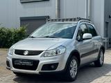 Suzuki SX4 Club/KLIMA/SHZ/BLUETOOTH - Suzuki SX4 mit Benzin-Antrieb: Allradantrieb, Limousine