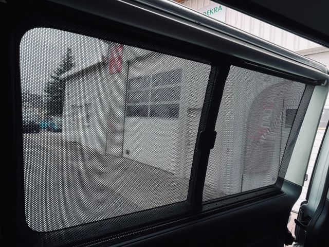 Volkswagen T5 Transporter Bus Caravelle lang*XENON*9SITZE*