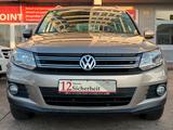 Volkswagen Tiguan Sport & Style *AUTOMATIK*1.HAND*STNDHZNG* - mit Benzin-Antrieb: Standheizung, Geländewagen