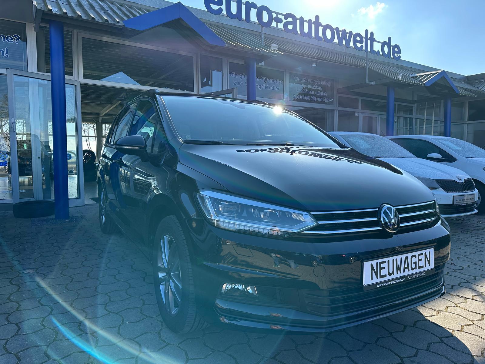 Volkswagen Touran 1.5TSI DSG Com. *AHK*Navi*el.HK*7Sitzer
