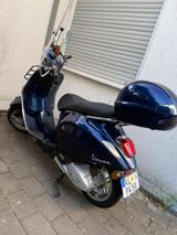 Vespa Primavera 125 - VESPA BLAU ROLLER