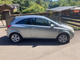 Opel Corsa 1.2 Satellite in Farbe Silbersee - Opel Corsa aus 2011: 1.2