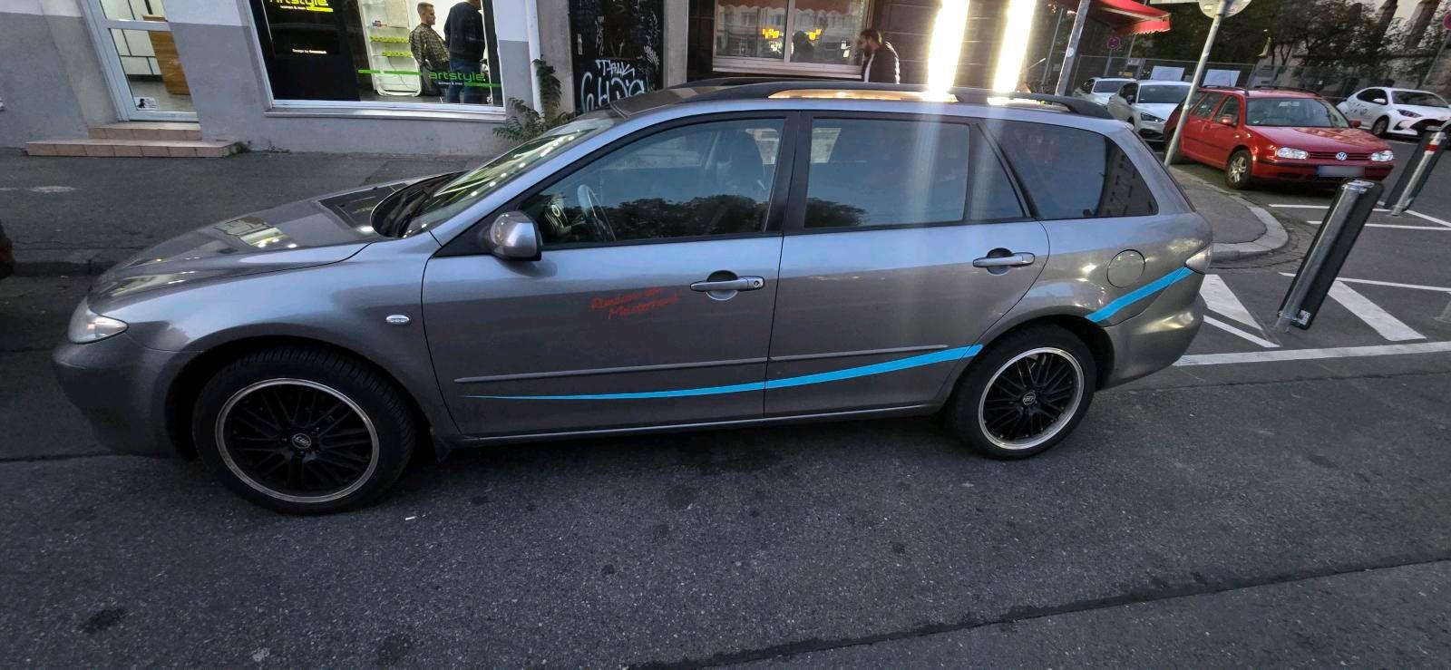 Mazda 2 2004 — photo 9