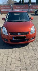 Suzuki Swift 1.3 Comfort A-M-T Comfort - Suzuki Swift mit Benzin-Antrieb: Orange, Limousine