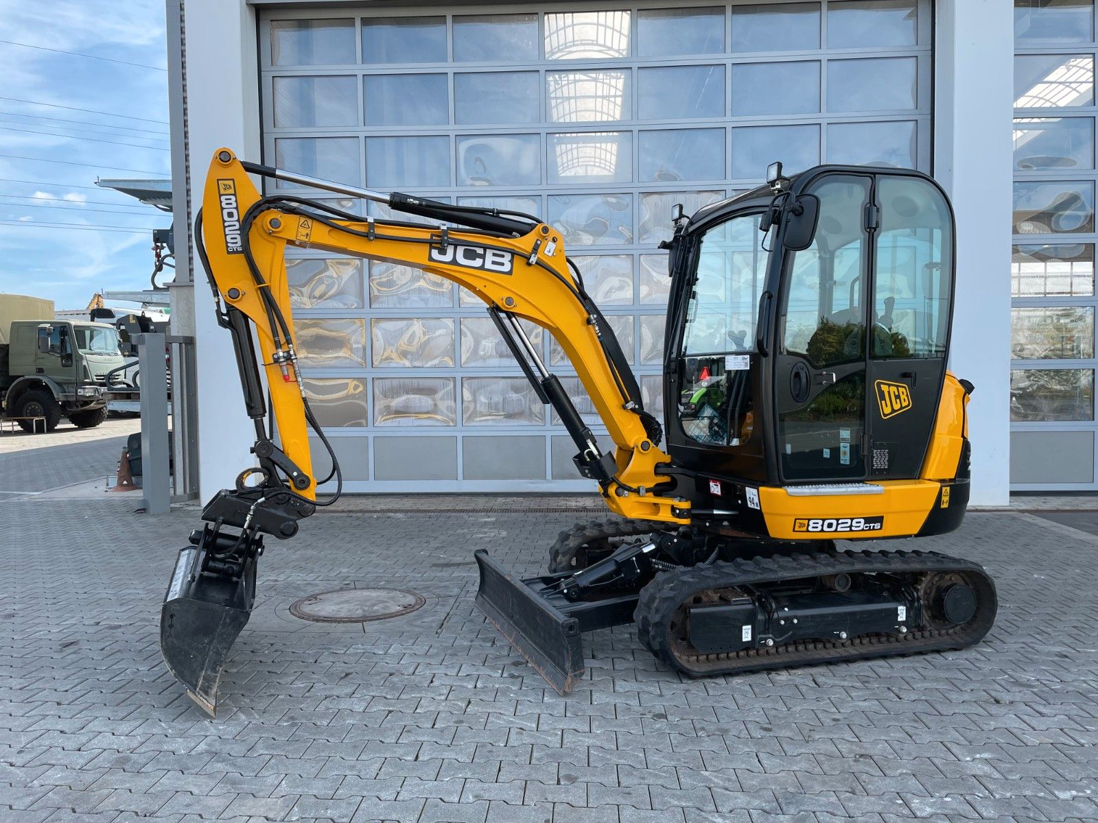 Fahrzeugabbildung JCB 8029 CT / 151h / 2023 / Inkl. Löffelpaket - mit KI generiert/bearbeitet