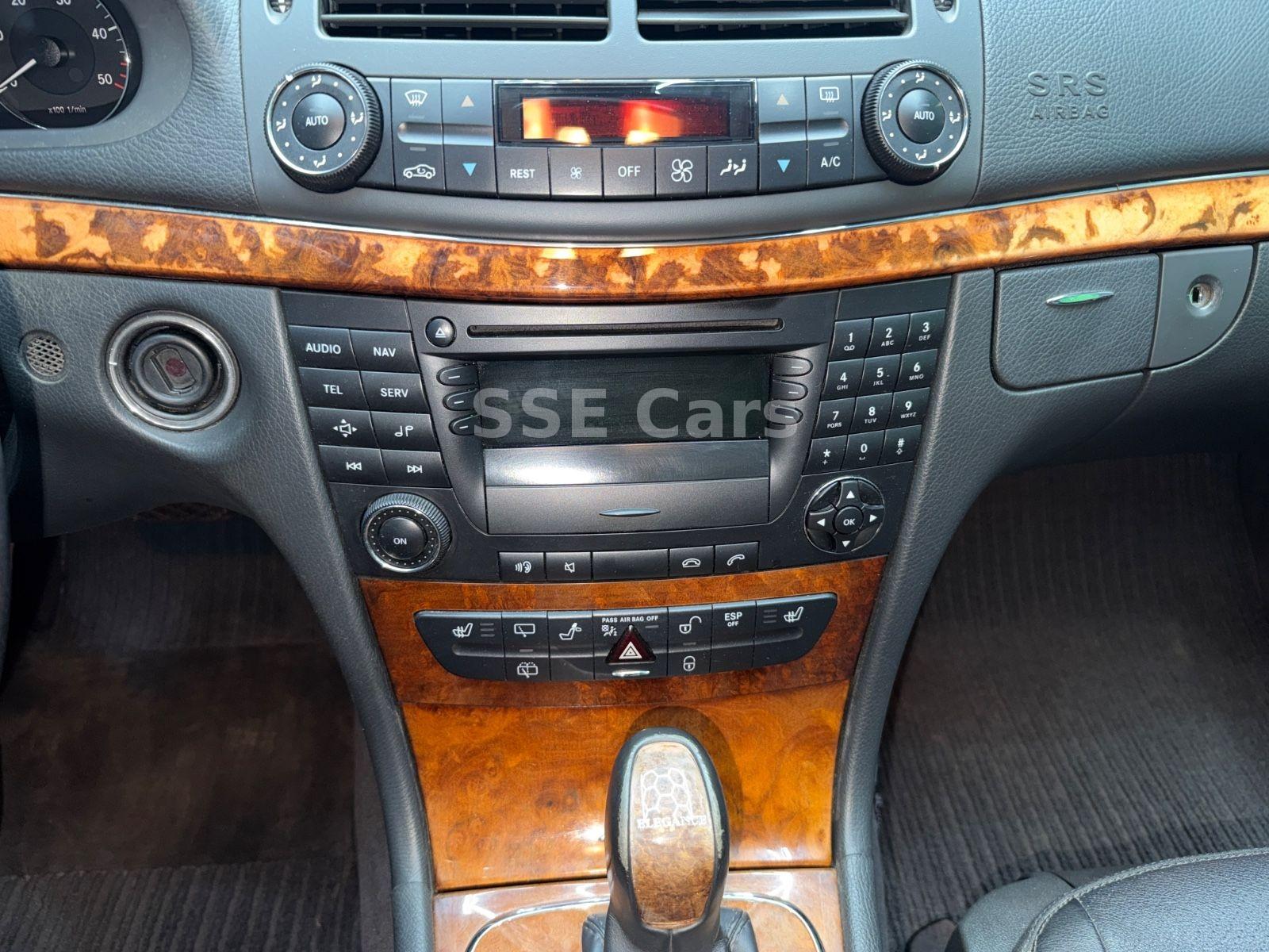 Mercedes-Benz E320 2005 — photo 18