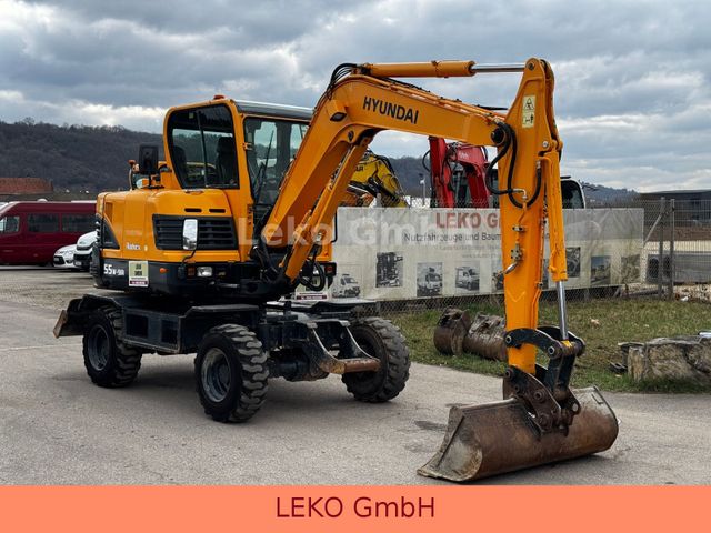 Hyundai Robex 55W-9A Mit Drei Löffeln