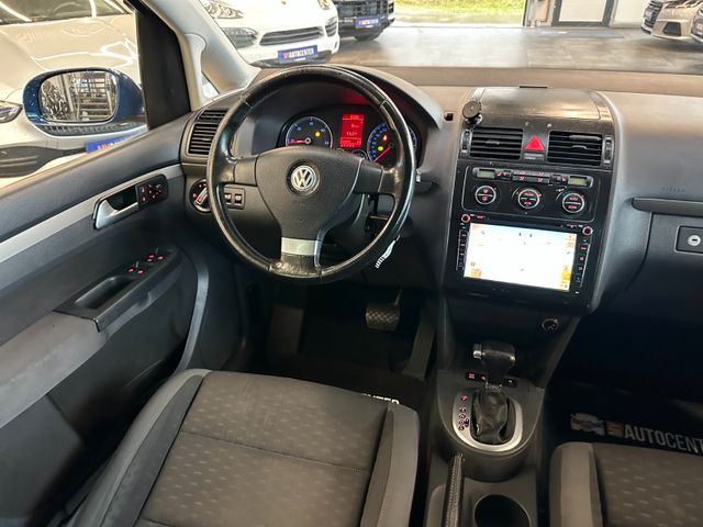 Volkswagen Touran  *7Sitzer*Navi*DSG*Sitzh*BiXenon*