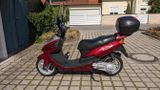 Daelim NS125 Roller (SG125F), rot-silber