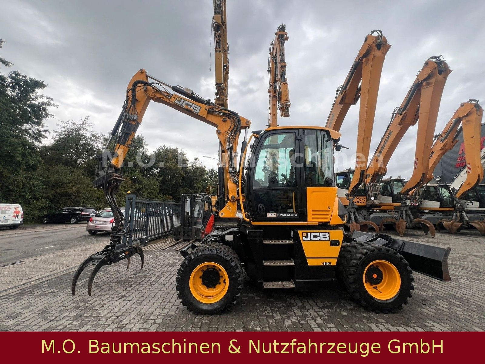 Fahrzeugabbildung JCB 110 W Hydradig / Holzgreifer / 2x Tieflöffel