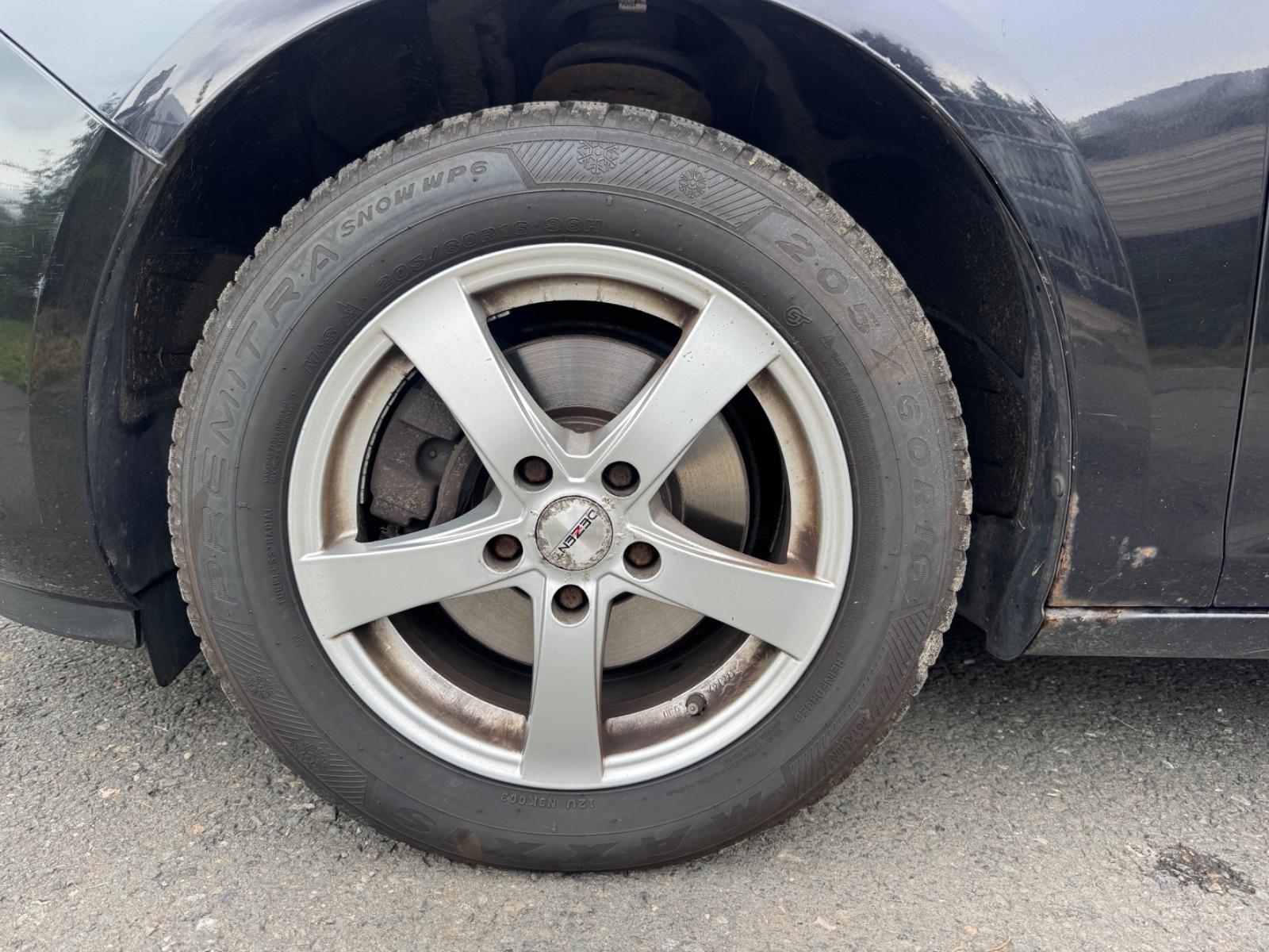 Opel Astra 2011 — photo 20