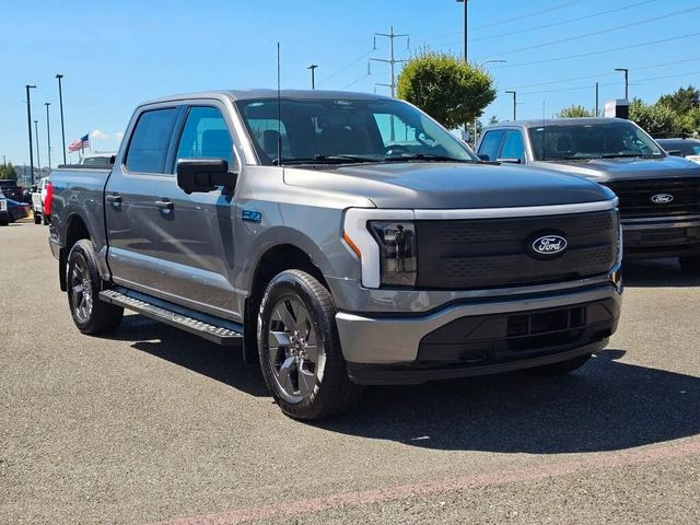 Ford F 150 Lightning XLT 2024 graumet im Vorlauf +11