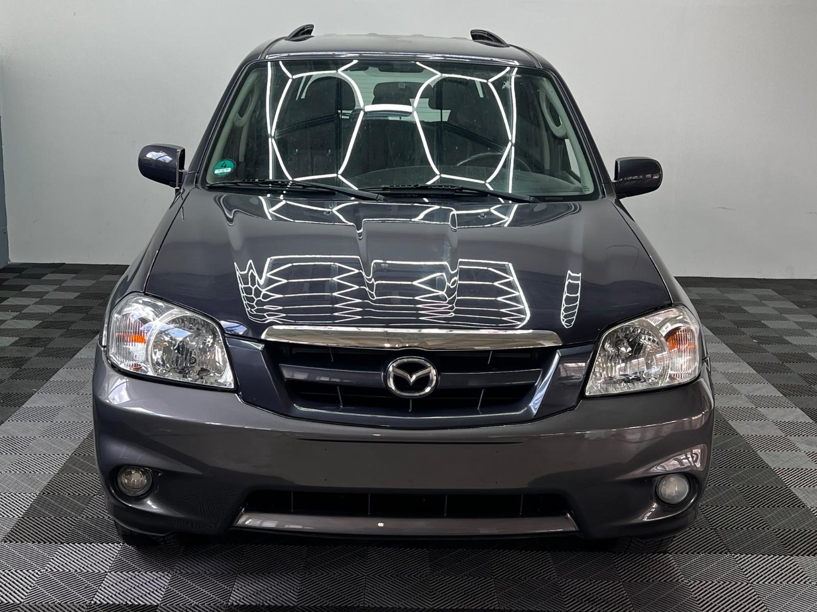 Mazda Tribute 2005 — вигляд ззаду