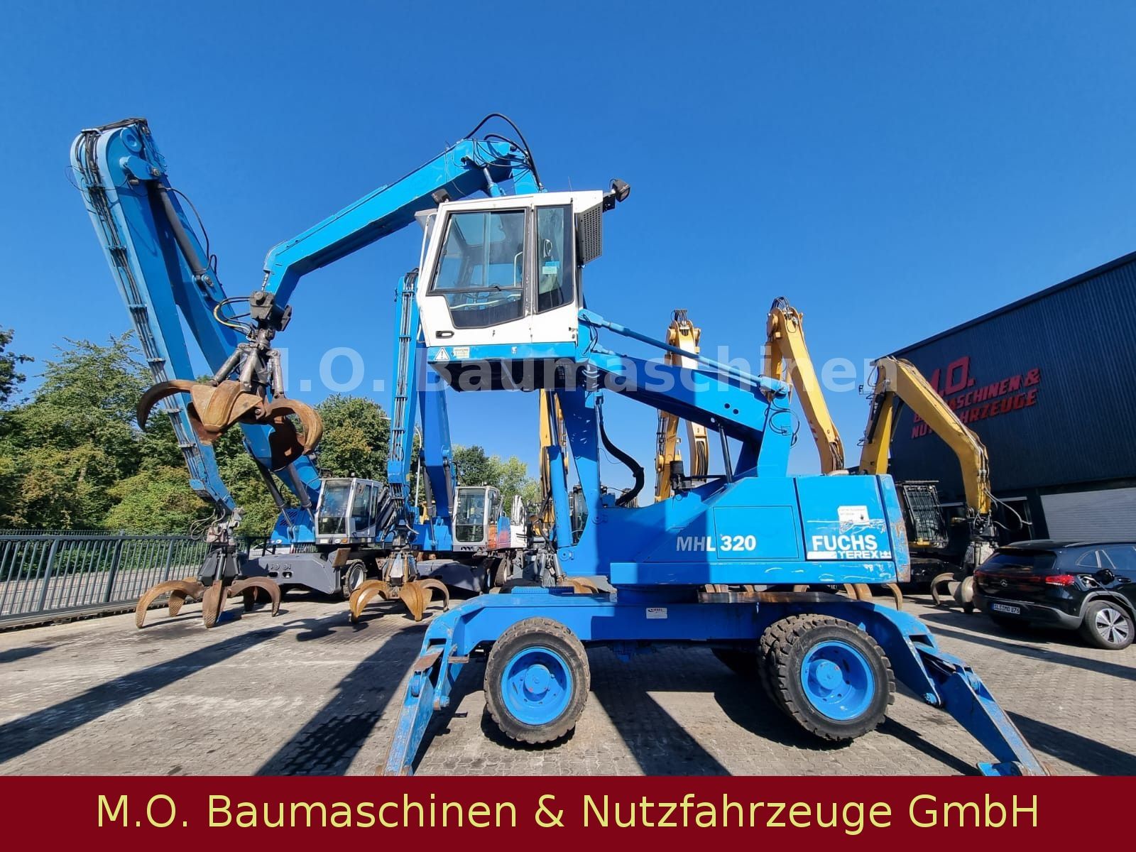 Fahrzeugabbildung Fuchs Terex MHL 320 / Polyp/ Liftkabine